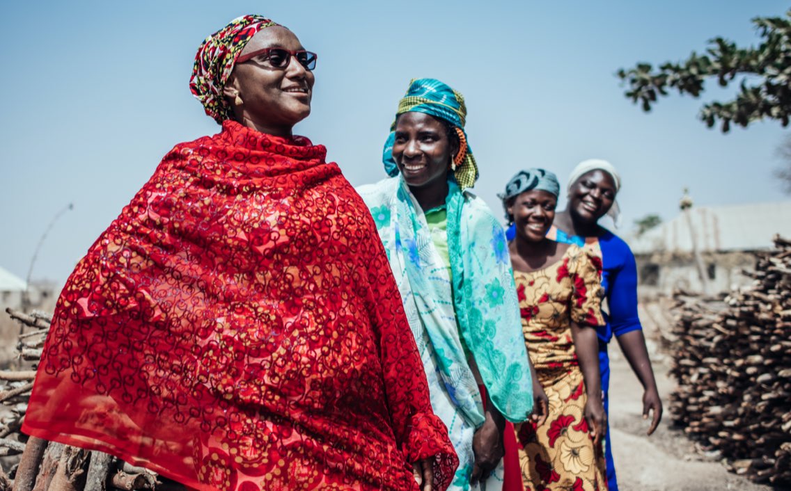 Children receiving educational materials